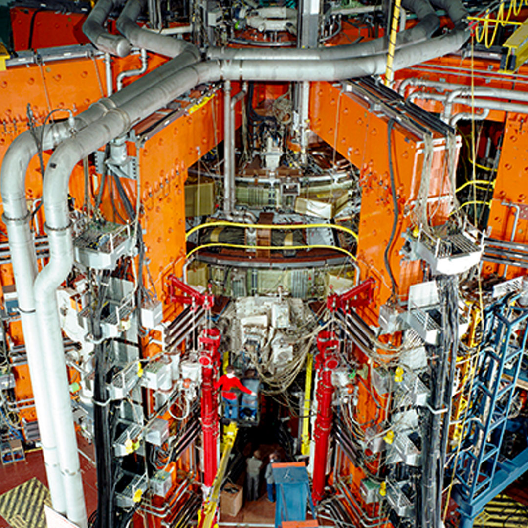 The Joint European Torus (JET) magnetic fusion experiment with myriad multi-colored heating, cooling, and measuring systems.